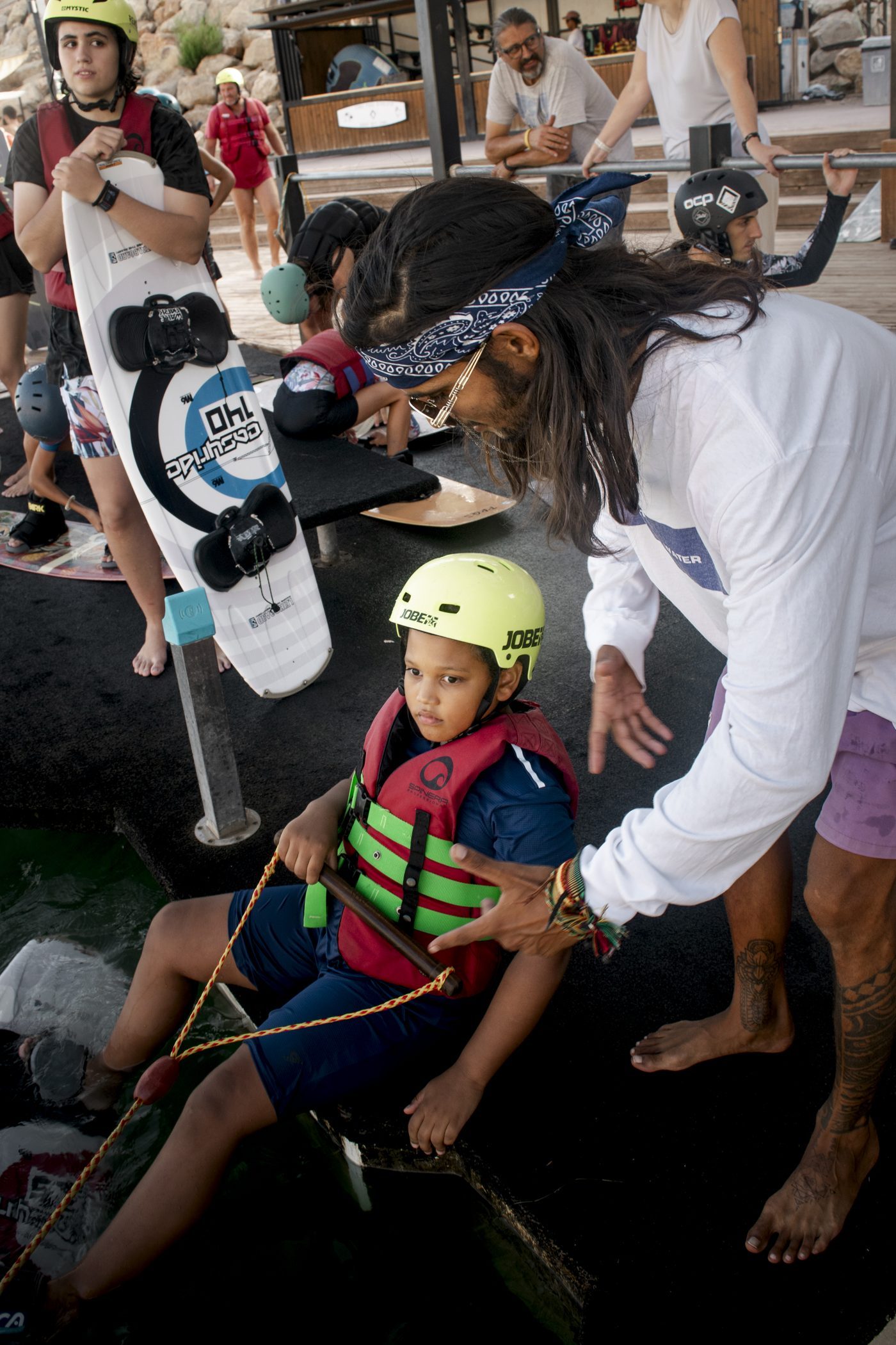Kids on stand up paddle boards